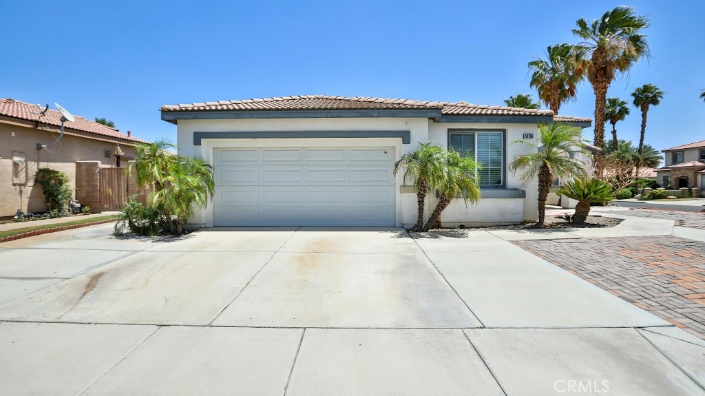 This beautifully refreshed property features sleek marble and ceramic flooring throughout, complemented by fresh interior paint—ready for immediate occupancy. The kitchen has been completely modernized with quartz countertops, a stylish new backsplash. Situated on a peaceful corner lot in a quiet neighborhood with NO HOA fees, this home also boasts a fully paved, low-maintenance backyard—ideal for gatherings and outdoor entertaining. Just minutes from the Polo Grounds and within Indio's short-term rental zone, this well-kept gem won't stay on the market for long. Schedule your visit today before it's gone!