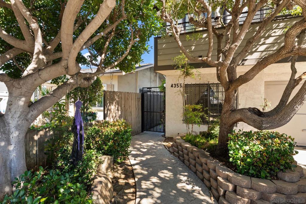 Step inside and welcome home to this sharp 2 bedroom, 2 bathroom single level home in a well maintained, small 7 unit gate community walking distance to restaurants, bars and shops, even a Michelin Key award winning hotel. This North North Park home is even walking distance to University Heights favorites! San Diego living at it’s best with low homeowner fees but lots of smarts, charm and character. This move in ready ground level unit has no stairs but a beautifully and professionally remodeled kitchen that looks onto it’s private back yard/patio! Two nice bedrooms and two full (tub and shower) bathrooms, one attached, and both BRs enjoy spacious closets upgraded by CALIFORNIA CLOSETS! Brand new (2022) dual paned slider door from primary bedroom to the back outdoor area. Also new dual paned windows in living room, kitchen and bedroom; new plantation shutters; luxury vinyl plank flooring. NEST thermostat; YALE Smartlock; Welcome home! See supplement for more This home truly does have it all...from its walkability to restaurants, coffee shops and bars on El Cajon Blvd. and 30th St. (Lafayette Hotel just got a Michelin Key; Cafe Madeleine; Thai Time NP; Working Class; Pour House & Belching Beaver NP; Leila; Observatory NP; Part Time Lover; COLLINS & COUPE & more!!) to the beautifully updated flooring, open kitchen with tons of counter space, gorgeously remodeled bathrooms, recessed lighting, in-unit washer/dryer, central air conditioning, ceilings fans in 3 rooms, private patio yard off the primary bedroom, cozy fireplace for those quiet nights at home, and 3 (tandem) parking spaces, it’s going to be hard to beat this one! Tastefully updated: Sellers replaced back (primary) bedroom slider door with brand new dual paned. They also recently remodeled the entire kitchen! NEW in 2025: Edward Martin Porcelain checkered tile; new quartz countertops; new GE oven with air fry; new Zephyr under cabinet range hood; new GE French Door refrigerator with filtered water and ice maker; new kitchen sink work station with glass rinser feature; new instant hot water dispenser! Bosch dishwasher. Central A/C. This gem is centrally located in the heart of one of San Diego’s most desirable neighborhoods, North Park! Come take a look for yourself and experience all that this lovely home and neighborhood have to offer.