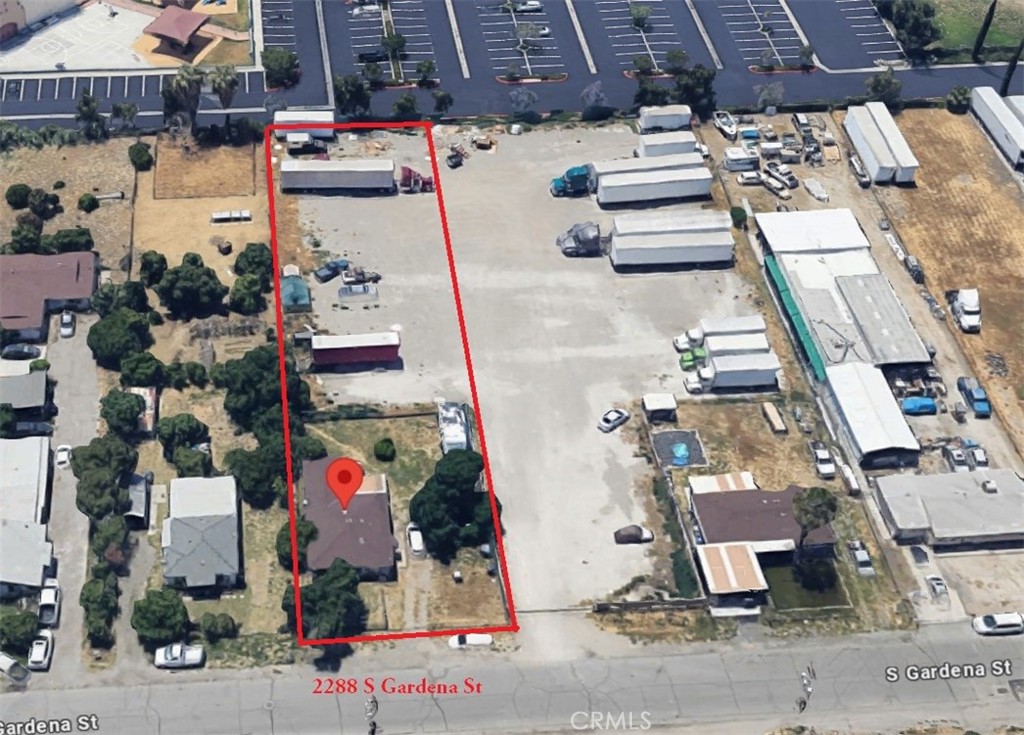 Excellent opportunity for a first time or experienced investor. Rent out the front house and develop the half acre. Lots of options as an investor. This house is located south of the 10 Freeway with quick access to the I-215 and I-210 Freeway Interchange. Close to Loma Linda University, VA Hospital and Redlands. Commercial zone CR3 adjacent to the Rock Church. Fenced front and back yard. Bonus room that can be used as family room or third bedroom. The house is grandfathered in on the commercial lot. Huge potential with half an acre (21,560 sqft. lot) with different types of businesses approved by the city. Store your RV, boat or vehicles. Buyer's due diligence for allowed intended uses approved by the city. Sold As Is. Adjoining lots also available (2268 Gardena. APN-0283-031-02-0000 & 2278 Gardena. APN-0283-031-03-0000). Washer and dryer hook-ups outside the house.