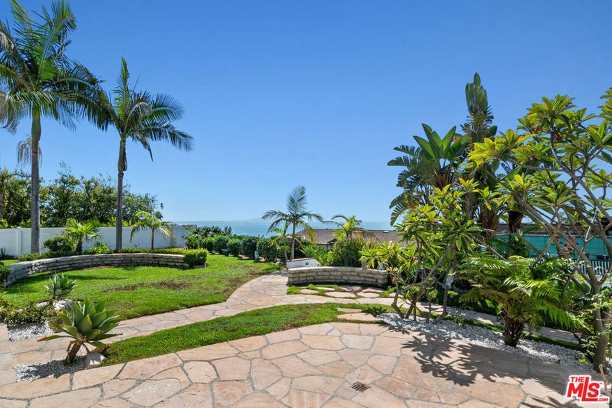 Welcome to Pacific View Estates, one of the most prestigious neighborhoods in Pacific Palisades. First time on the market, this legacy property offers an incredible opportunity to own nearly half an acre of ocean-view home in a community of only 100 homes.This light and bright beautifully remodeled Mid Century single-level home offers four-bedrooms, three-bath and combines timeless elegance with modern upgrades. Inside, enjoy a bright, open floor plan with new floors, freshly painted interiors and exteriors, and seamless flow throughout. The remodeled chef's kitchen boasts custom cabinetry, sleek quartz countertops, and high-end finishes perfect for cooking, gathering, and entertaining. Spacious bedrooms and spa-inspired bathrooms provide a serene retreat for everyday living. All this plus a new roof and new H-VAC system. Outdoors, the property truly shines. A lush tropical garden, reminiscent of an island oasis, surrounds the home with vibrant greenery and tranquility. Set on nearly half an acre, the grounds offer endless possibilities: terrace the hillside for panoramic Queen's Necklace views, build a pool in the front or back, or create an ADU for additional living space. The expansive yard is both a sanctuary and a blank canvas to design your dream estate. From watching sunsets over the Pacific to enjoying the quiet beauty of the tropical landscaping, this home offers the essence of California coastal living. Just minutes from world-class beaches, Palisades Village, scenic hiking trails, and top-rated schools, this rare offering combines move-in ready comfort with the potential to create a truly one-of-a-kind dream property.