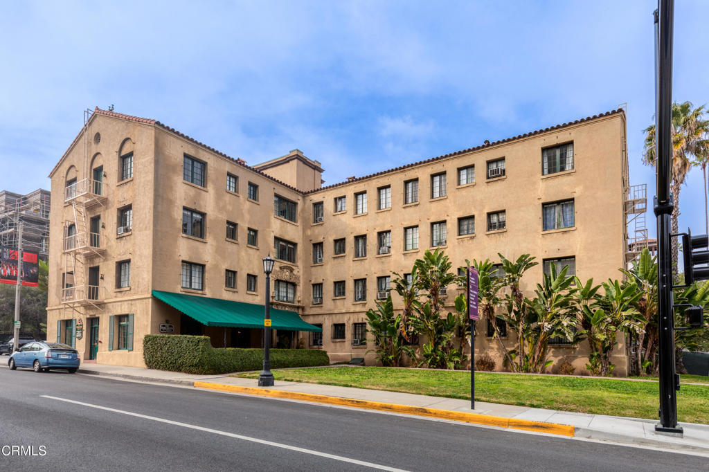 Own a piece of history! The Barcelona. This 1922 Pasadena legend is perfect for the discriminating buyer looking to live in the Pasadena Playhouse Historic District. Through the original lobby and past the front desk, one finds the original elevator, (although newly updated mechanically), that leads to this top floor one bedroom corner unit. With commanding views to the south and east, the homes feels light and bright throughout the day. In addition to the corner living room, character kitchen, full bath, and large bedroom with ample closet, there is a separate small office area just off the main room. There is an additional storage space and a large laundry area in the basement. The Barcelona is a Mill's Act building, and its location is convenient to local shopping, theaters, and the Metro Gold Line. A unique and romantic unit ready for its next steward.