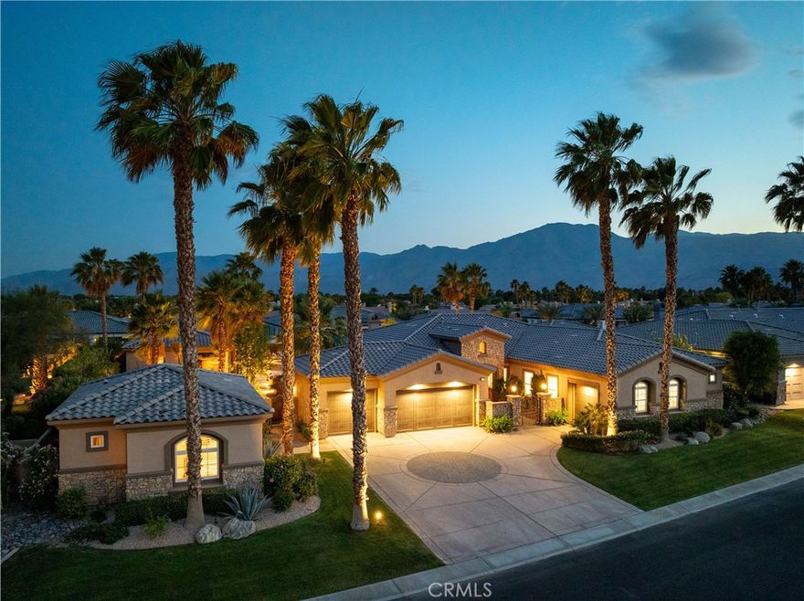 There are homes you live in, and then there are homes that change the way you live. 81893 Thoroughbred Trail is one of those rare finds, a private desert retreat that blends everyday ease with unforgettable experiences. Set against dramatic southern mountain views, the property makes a striking first impression with custom circular stonework on the driveway and gated stone entry. Imagine starting your mornings with coffee on a sunlit patio as mountain silhouettes rise in the distance. Picture weekends where friends and family gather in two private casitas, with laughter carrying from the reimagined quartzite bar to the glowing pool. At sunset, the yard becomes your own resort with BBQ sizzling, patio heaters warming the night, and sapphire reflections dancing across the water. Inside, sunlight pours through French doors into freshly painted interiors with an open layout designed for connection. The chef’s kitchen inspires with premium stainless appliances, granite countertops, and stylish pendant lighting, while comfort flows throughout with new recessed lighting and refreshed ceiling fans. The primary bedroom offers a fireplace, a spa-like soaking tub, and a generous walk-in closet, creating a private retreat of its own. Outdoors, the entertainer’s yard features a Pebble Tec pool, salt-chlorine system, LED lighting, built-in BBQ, heated patio with electric drop-down patio screen, misters around the patio and casita for staying cool in the heat, and lush turf framed by outdoor lighting. Additional features include two sets of washers and dryers, dual new water heaters serving both the main home and the casitas, a whole-house water filtration and softening system, a three-car attached garage, and an additional one-car attached garage. Fully furnished and turnkey, this home is designed for those who value privacy, connection, and effortless entertaining, offering a lifestyle where every day feels like a vacation.