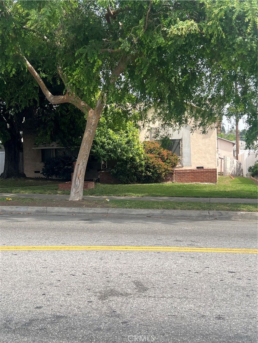 Photo of 9906 S Van Ness Ave, Los Angeles, CA 90047 (MLS # SB26071116)