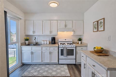 Photo of 815 N Rose AVE #F, Compton, CA 90221 (MLS # NP26179806)