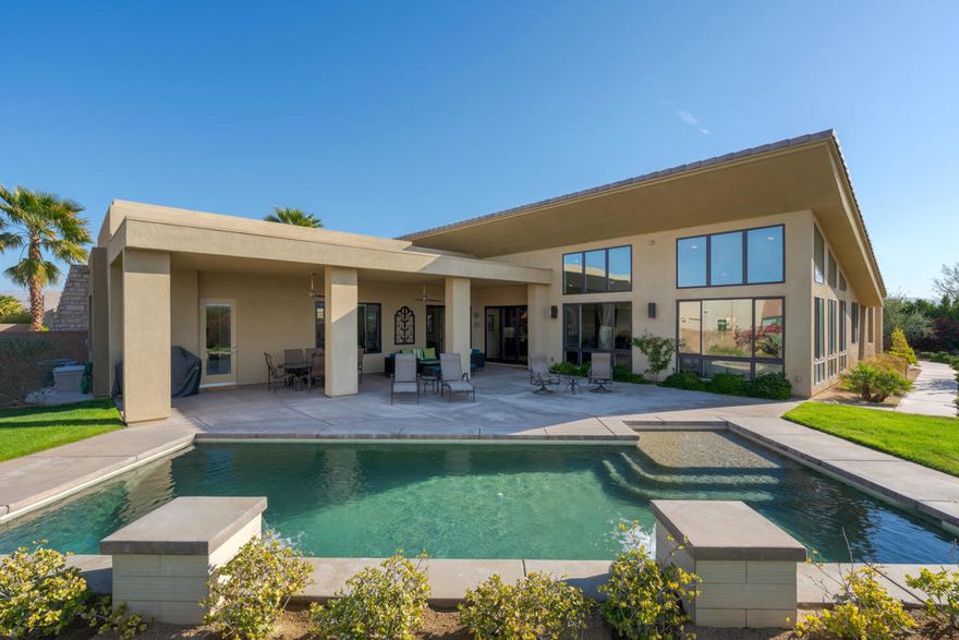 Welcome to Estilo at Rancho Mirage! This Amazing home is available for long term rental 6 month minimum! Enjoy Breathtaking Panoramic Mountain Views from every angle of this Contemporary home. Enter the home and take in the stunning architecture, walls of glass with rolling Mountain Views, soaring ceilings and tons of natural light. The Great Room has a fireplace with open niches on either side and connected to a wet bar. The kitchen has a large center island, stylish Cambria Quartz countertops, backsplash and stainless-steel Kitchen Aid appliances. This desirable home offers 3 bedrooms, 2.5 baths with a designer powder room with floating vanity. The oversized rear yard is a private resort with spectacular mountain views, lush landscaping including a citrus tree garden, an extended covered patio, Solar Heated pebbled pool & raised water features. There is a split 3-car garage which all have an epoxy floor. For energy savings the home features an on demand tankless hot water system and is located in IID for low-cost electricity. This is the unique contemporary view home you have been waiting for!