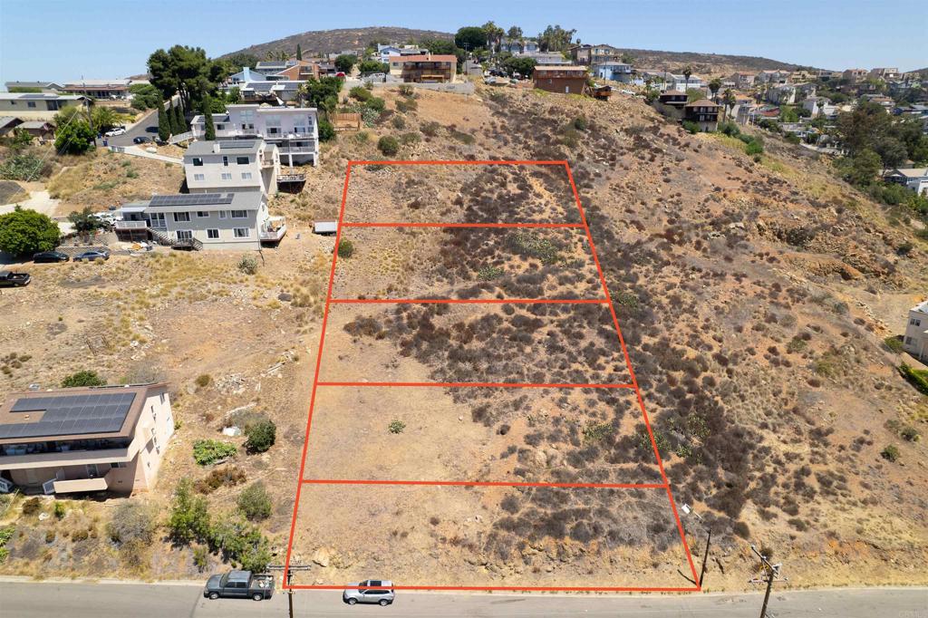 If you're looking to invest in land and build out your dream home or your next development project, this is a rare and amazing opportunity to own 5 lots being sold as one HUGE lot!! With almost a full acre, you can utilize SB9 to develop 4 units as one big lot or build out each lot individually. You can have access to a private driveway (right of way) leading all the way up to the furthest lot. You have a sewer lateral at the corner of the lot and access to other utilities. Take advantage of these stunning views and build out your next investment here!