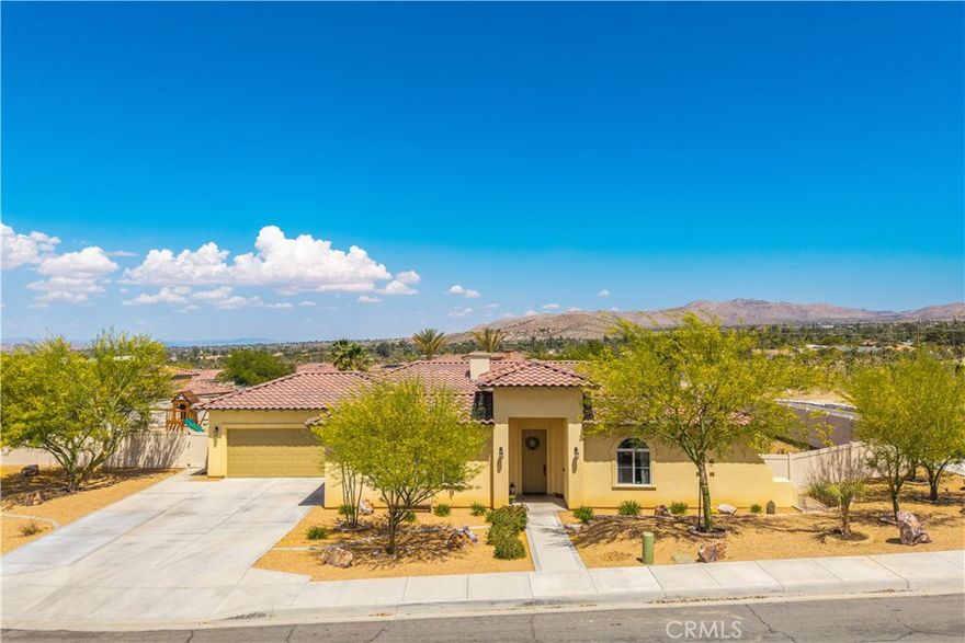 Beautiful 3 Bed, 3 Bath Pool Home with 3-Car Garage on a Cul-de-Sac!

Welcome to this stunning 1,898 sq ft, 3-bedroom, 3-bathroom pool home situated on a fenced corner lot in a quiet cul-de-sac in the desirable Mesquite Homeowners Association. This property blends privacy, function, and beauty—offering the perfect desert oasis. As you arrive, you’ll be greeted by beautiful landscaping, an extended concrete driveway for extra parking, and a charming courtyard entry complete with an outdoor fireplace—the perfect spot for morning coffee or evening relaxation. The backyard is fully enclosed with 6-foot privacy vinyl fencing and features a newer in-ground pool and spa (approx. 3 years old) with a pool heater, perfect for year-round enjoyment. There’s also a covered concrete patio, mountain views to the East, a new Tuff Shed, and even playground equipment that can be included! Inside, the spacious kitchen is a showstopper with granite countertops, a large center island, sleek in-cabinet trash can, a new chandelier, and updated lighting throughout. It’s open to the living and dining areas, all with views of the beautifully manicured backyard and pool. The two guest bedrooms are joined by a Jack-and-Jill bathroom, and the primary suite is a luxurious retreat with a cozy nook, backyard access, and an ensuite bathroom featuring a freestanding clawfoot soaking tub, a large walk-in river rock shower with a rain shower head and wand, and dual vanities. You’ll love the massive attached laundry room with a utility sink, tons of storage, and countertop space—perfect for folding and organizing. The attached 2-car garage is fully finished, and there’s an additional finished 1-car garage for even more utility or hobby space. Other upgrades and features include: Reverse osmosis and water softener system, Wired security camera system, Fruit trees galore: cherry, pomegranate, orange, lemon, lime, nectarine. Affordable $60/month HOA payment plan. This home is truly turnkey and offers everything from comfort and style to privacy and practicality. Homes with this level of detail and amenities rarely last—schedule your private showing today!