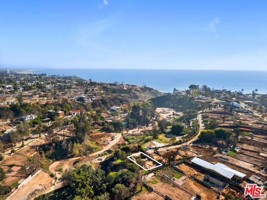 Privately situated at the end of a quiet cul-de-sac with neighbors only on one side, 627 N Marquette Street presents a rare opportunity to build a custom ocean view residence in peaceful Pacific Palisades. The 7,813 SF lot offers versatility and the potential for a two-story home that maximizes sweeping canyon and ocean views (including Catalina Island). Perched atop a scenic green canyon creek setting, the property provides a unique blend of privacy and natural beauty while remaining just minutes from Palisades Village, top-rated schools, hiking trails, and the beach. Be a part of the resurgence of our Palisades community. This is the opportunity to create a one-of-a-kind coastal retreat in one of Los Angeles' most sought-after neighborhoods.