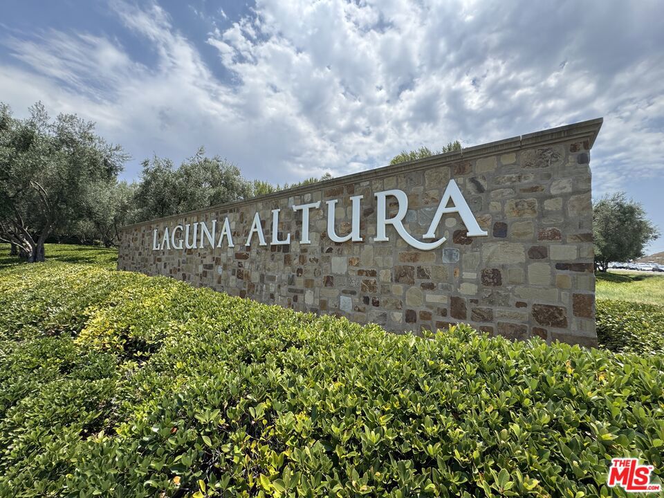 Welcome to 86 Cipresso, a stunning 4-bedroom, 4-bathroom designer home nestled in the highly sought-after Laguna Altura community, one of Irvine's most exclusive and beautifully designed neighborhoods. This San Remo "Three X" floor plan (the most coveted layout) offers luxury, space, and an unbeatable lifestyle in one of the nation's top-ranked school districts. Luxurious Living in an Elite Gated Community, Laguna Altura is a guard-gated sanctuary of elegance, offering resort-style amenities, including: Sparkling community pools (including a Junior Olympic-sized pool) Expansive parks, tot lots, and full-court basketball, Scenic walking and biking trails, Multiple BBQ and lounge areas perfect for entertaining. Low HOA fees for unparalleled value, Sophisticated Interior with Designer Touches. This bright and airy end-unit residence boasts: Spacious great room with a cozy fireplace, formal dining area, and breakfast nook, Gourmet kitchen with granite countertops, stainless steel appliances, walk-in pantry, and abundant cabinetry, Main-floor bedroom with full bath, ideal for guests or multi-generational living, Custom window treatments & plantation shutters, Recessed lighting throughout for a modern, polished look, Glass walls opening to a private backyard, perfect for seamless indoor-outdoor entertaining, Prime Irvine Location World-Class Living Situated just minutes from Laguna Beach, this home offers the best of coastal and city living: Steps from the Irvine Spectrum Center (high-end shopping, dining, and entertainment) Quail Hill Village Center nearby for everyday conveniences, Top-rated Irvine schools (Alderwood Elementary, Rancho San Joaquin Middle, University High) Your Dream Lifestyle Awaits. Live where luxury meets convenience in this rarely available Laguna Altura gem. Enjoy low HOA fees, 24/7 security, and resort-like amenities all within one of the most coveted neighborhoods in Irvine. Don't miss this opportunity schedule your private tour today!
