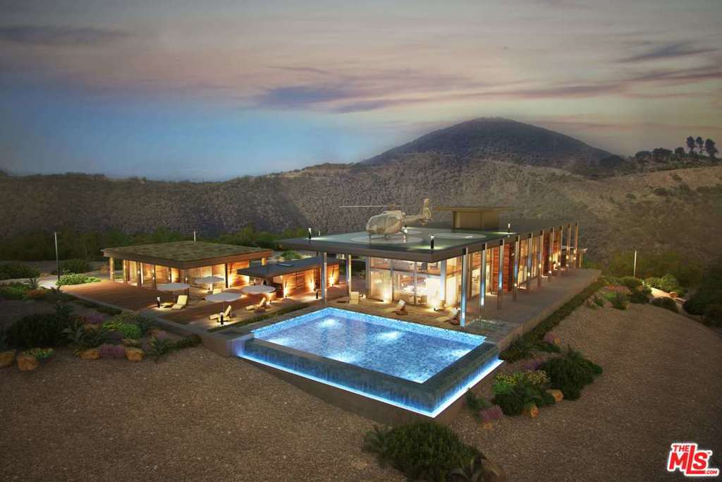 Striking James Bond-esque compound, artfully located on 20 acres of prime Malibu land overlooking the coastal landscape w/ convenient access to private aviation,blending architectural excellence w/the highest standards of engineering.An architectural feat incorporating sustainability w/pristine design.The main home feat. 5bd/6ba,media room,wine cellar,library,office & safe room.The exterior boasts an infinity pool, rooftop helipad, 5 car garage w/electric charging stations. The guest house features 2 bd/1ba w/kitchen living & dining rooms. Pool house feat a wet bar, outdoor kitchen w/wood fired oven, sundeck & outdoor shower.Possibilities of the compound have been designed to include a high-tech Industrial Multi-Use Shop w/Mezzanine for creative space, horse stable or 22 car garage. Platinum LEED certified & engineered to double the earthquake code,the property is self-powered by Lumos panels & lithium batteries, fully automated,stainless steel waterlines. Completed price:$34,000,000