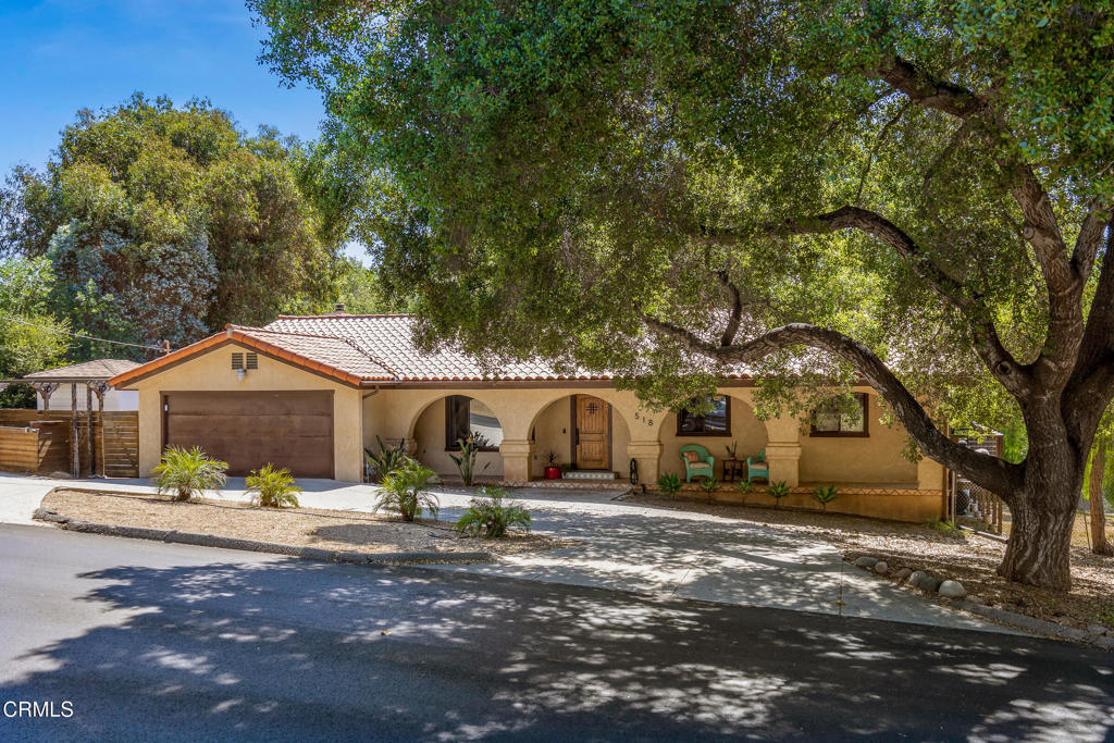Spanish Hacienda with Room to Dream! - Downtown Ojai Living at Its Best.Don't miss this rare chance to own an oasis in the heart of downtown Ojai! This spacious, sun filled, Spanish-style retreats is just down the street from everything you need yet feels completely secluded- offering the perfect blend of privacy, space and opportunity. With endless potential, this 3-bedroom, 3-bath gem is perfect for families, retirees, or anyone dreaming of a magical weekend escape.Set on nearly half an acre across two parcels (approx. 19,601 sq ft), the home blends classic character with room to grow. Inside, Saltillo tile floors, oversized windows, and a cozy gas-burning fireplace create warmth and charm, while the generous layout offers a family room, custom built-ins, and a vintage-inspired kitchen with bar seating and ample storage. All three bedrooms are very spacious, offering comfort and flexibility for families or guests. The expansive primary suite features its own en suite bathroom and a large walk-in closet. Attached to the outdoor deck is an enclosed sunroom addition (unpermitted) that adds extra interior living space filled with natural light. An extra large laundry room also provides added convenience for daily living.Outside, the deep backyard is a canvas for your vision, add a pool, guest house and transform the property into your dream compound. Mature oak and pink peppercorn trees along with lush landscaping provide privacy, while a detached bonus structure with electricity and its own AC unit offer the perfect space for a home office, creative studio, or private guest retreat. Location is everything. This home is just a 5-minute walk to the Ojai Athletic Club & pool, top restaurants and cafes, the local grocery store, post office and the Ojai Valley Trail. You're also just steps away from Libbey Park, farmers markets, public tennis and pickleball courts...and so much more! It's one of Ojai's most walkable, vibrant neighborhoods, ideal for full-time living or a vacation retreat.This is a unique opportunity to create something truly special in one of California's most beloved small towns. SELLERS ARE MOTIVATED!'bring your vision and offers.'