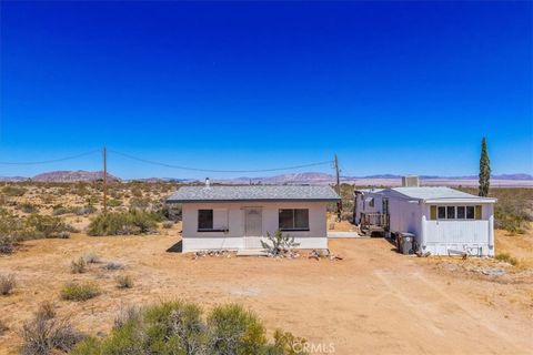 Photo of 60650 Winters Rd, Landers, CA 92285 (MLS # JT26083249)