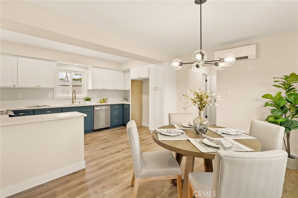 Gorgeous RENOVATED 3-bedroom, 3-bathroom home with approximately 2261 square feet of living space in move in condition. Downstairs you will find the updated kitchen has new two-tone cabinets with ample storage, sleek new counter tops, custom tile backsplash, new stainless-steel appliances, and stylish new plumbing and lighting fixtures. A spacious living room that leads to the outdoor space with a patio and grass area perfect for entertaining. Dining room off the kitchen, indoor laundry room and bathroom with updated vanity and fixtures. Upstairs are three spacious bedrooms and 2 bathrooms. Both the hall and primary bathrooms have new double vanities, custom tile work and new fixtures. The spacious primary bedroom features an attached ensuite bathroom and plenty of closet space. Other features include freshly painted interior and exterior, luxury flooring in living areas and bedrooms, tile flooring in bathrooms, vinyl dual pane windows, new mini split AC and heating system with a unit in each bedroom and 2 in the living areas, and new roof. There is a 2-car attached garage with direct access and enclosed gated area off the garage that can be used for additional off-street parking, entertaining area, or a great area for additional storage.
