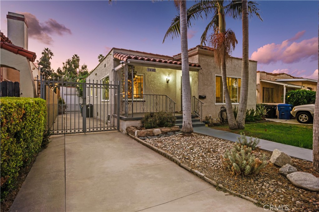 Stunningly Remodeled Home in Prime Park Hills Heights! Welcome to this beautifully reimagined home originally built in 1925 and thoughtfully updated for modern living, this single-level residence combines timeless charm with luxurious upgrades in one of Los Angeles’ most desirable neighborhoods.
At the heart of the home is the newly added primary bedroom suite, a true sanctuary that opens directly to a lushly landscaped private garden and open patio, perfect for relaxing or entertaining. The suite features a lavish spa-inspired bathroom complete with a large vanity, heated floors, an oversized soaking tub, and a separate walk-in glass-enclosed shower. A dramatic secondary bathroom elevates everyday living with a spacious shower designed for two. Inside, you’ll find bright open spaces with recessed lighting, crown molding, ceiling fans, plantation shutters, and beautiful wood flooring throughout. The chef’s kitchen boasts self-closing cabinetry, granite countertops, and stainless steel appliances including a gas cooktop, oven, microwave, dishwasher, and refrigerator, all flowing seamlessly into the living and dining areas for effortless entertaining. Other highlights include: Dedicated laundry room with washer/dryer hookups attached garage plus driveway with RV potential. Set on a quiet street with sidewalks, curbs, and streetlights, this home offers both neighborhood charm and modern convenience. You’ll be minutes from shopping, dining, parks, and easy access to commuter routes while still enjoying the privacy of your own garden retreat. More than just a home—it’s a lifestyle. With its designer finishes, luxurious primary suite, and entertainer’s backyard, this move-in-ready residence is an incredible opportunity in the heart of Los Angeles.
Don’t miss your chance to own this one-of-a-kind gem. Schedule your private tour today!