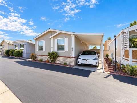 Photo of 1540 E Trenton Avenue #125A, Orange, CA 92867 (MLS # OC26198818)