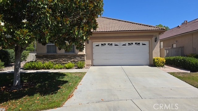 Welcome to the Oasis – a premier 55+ gated community!
You'll love this beautifully maintained 2,085 sq. ft. home, designed for both comfort and style. A glass front door warmly welcomes you into a bright and spacious layout.
The formal living and dining rooms feature soaring clerestory windows and elegant tile flooring throughout, offering a light-filled and open feel. The kitchen and family room embrace an open-concept design—perfect for entertaining family and friends. The kitchen includes a center island, built-in appliances, ample cabinetry, a cozy breakfast nook, and flows seamlessly into the family room, which boasts a charming fireplace and vaulted ceilings throughout.
The primary suite is generously sized, complete with a walk-in closet, dual-sink vanity, soaking tub, and a separate shower. A second bedroom features its own private en-suite bathroom, ideal for guests or extended family.
Additional features include an indoor laundry room, a separate guest bath, and a spacious office/den. Outside, enjoy a fully fenced yard with a slatted patio cover and a two-car garage.
Oasis is a fully gated community with a staffed security gate, offering peace of mind and a vibrant social atmosphere.
Don't miss your chance to live in one of the most desirable 55+ communities around!