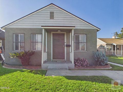 Photo of 524 W Almond Street, Compton, CA 90220 (MLS # P1-26077)