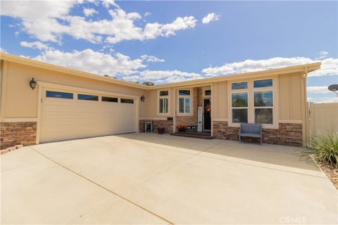 Photo of 10961 Desert Lawn Dr (527 Robellini Rd) DR #527, Calimesa, CA 92320 (MLS # IG26211300)