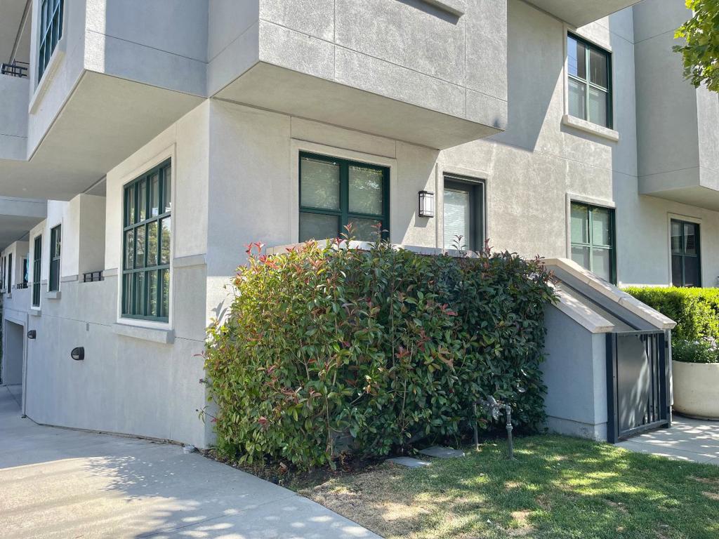 Stunning Corner Ground-Floor Downtown San Mateo Condo with Private Entrance! Experience luxury living in this beautifully appointed 2-bedroom, 2-bathroom corner unit located in the heart of downtown. This ground-floor Nazareth Plaza condo offers the rare convenience of a private entrance and is move-in ready with high-end finishes throughout. The gourmet kitchen is a chefs dream, featuring granite countertops, brand-new stainless steel appliances, gas cook-top, and limestone flooring. The open-concept living and dining area is enhanced by rich hardwood floors and custom Hunter Douglas shades, creating an elegant yet comfortable atmosphere. Both bathrooms are finished in exquisite crema marfil marble, providing a spa-like experience. Additional highlights include central A/C and heating, in-unit laundry, and two deeded parking spaces in a secure underground garage. Residents also enjoy access to an on-site gym. Don't miss this rare opportunity to own a stylish and move-in ready, ground-level home in one of downtown's most desirable buildings and location - few block from shopping, dining Caltrain and more... Welcome Home!