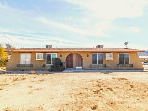 Photo of 73615 Sun Valley Drive, 29 Palms, CA 92277 (MLS # JT26094771)