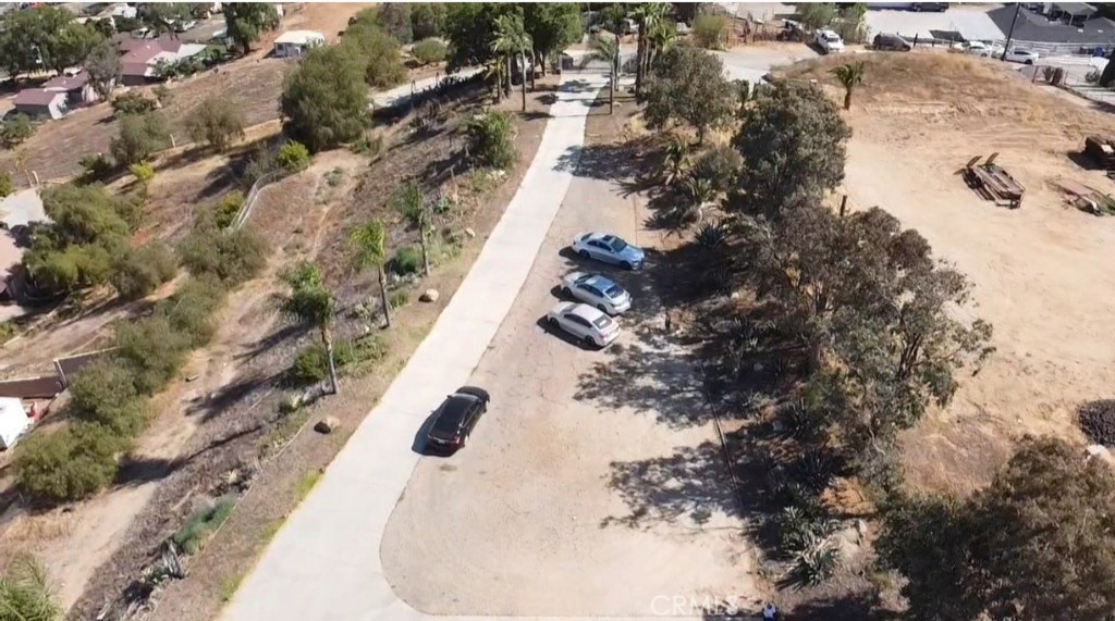 Welcome to your custom home with a private long gated driveway to leads to a view that is breathtaking. This Estate type Ranch is in the Heart of Jurupa Valley - with endless possibilities. The house offers 4 bedrooms plus a bonus room, with a total of 2,617 Sq, Ft. This property is situated on 2.07 acres , perfect to have equestrian activities and or permitted agriculture operations. ( buyers to verified zoning and permits ). The kitchen it is upgraded with granite counters tops kitchen island, the living room it is oversized , the family room offers a lot of room and a fire place. The offset staircase leads to 4 bedrooms and 2 full bathrooms, the master bedroom is over sized , with a walking closet, spacious master bathroom with separate tub and shower. The garage is for 3 cars. The property combines rural flexibility with urban proximity with convenient access to freeways , schools , shopping centers , restaurants and more. Call today and make this property your Ranch.