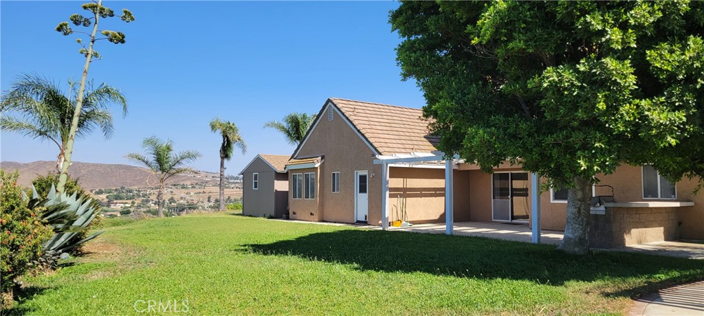 Welcome to your custom home with a private long gated driveway to leads to a view that is breathtaking. This Estate type Ranch is in the Heart of Jurupa Valley - with endless possibilities. The house offers 4 bedrooms plus a bonus room, with a total of 2,617 Sq, Ft. This property is situated on 2.07 acres , perfect to have equestrian activities and or permitted agriculture operations. ( buyers to verified zoning and permits ). The kitchen it is upgraded with granite counters tops kitchen island, the living room it is oversized , the family room offers a lot of room and a fire place. The offset staircase leads to 4 bedrooms and 2 full bathrooms, the master bedroom is over sized , with a walking closet, spacious master bathroom with separate tub and shower. The garage is for 3 cars. The property combines rural flexibility with urban proximity with convenient access to freeways , schools , shopping centers , restaurants and more. Call today and make this property your Ranch.