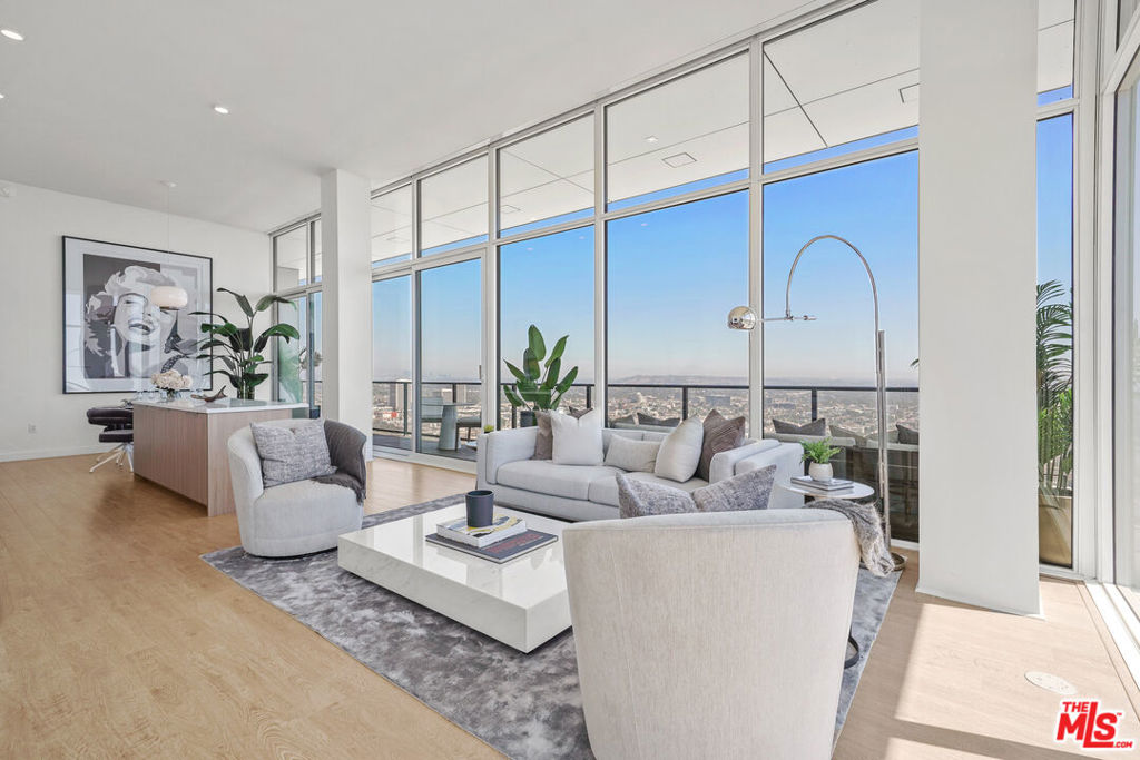 NOW LEASING ON THE 34TH FLOOR PENTHOUSE FLOOR! Unit 3402 is a 2 BR / 2 BA apartment unit featuring a spectacular south west wraparound porch, floor to ceiling glass, 15' ceiling, custom lighted closets, large bathrooms and more. The Landmark Los Angeles is a dazzling 34 story residential tower offering sophisticated floor plans paired with unparalleled views and resort-inspired amenities. Living at The Landmark, residents will experience the unique indoor/ outdoor lifestyle for which Los Angeles is known. Enjoy the view from your expansive balcony where you'll bask in the spectacular ocean and mountain views accompanied by the cool ocean breeze. Get into the best shape of your life in the professional fitness center or swim laps in the Junior Olympic size pool. For the days when all you want to do is kick back and relax, you'll appreciate the chaise lounges and umbrellas surrounding the heatd heated pool and spa, the club room, plush resident lounges and on-site cafe fronting a beautifully landscaped one acre park. The Landmark Los Angeles offers the sophisticated and unparalleled resort-inspired living experience you've dreamed about. Our stylish and modern apartment residences offer, floor to ceiling windows with patio access from both bedroom and living rooms, gourmet kitchens with custom Italian cabinetry and state-of the-art, energy efficient appliances, premium wood-style plank flooring, walk-in closets with custom shelving, in-unit washer and dryer, rolling window shades, and so much more. Apartment photos, floor plans and renderings are for illustrative purposes only and may be virtually staged.
