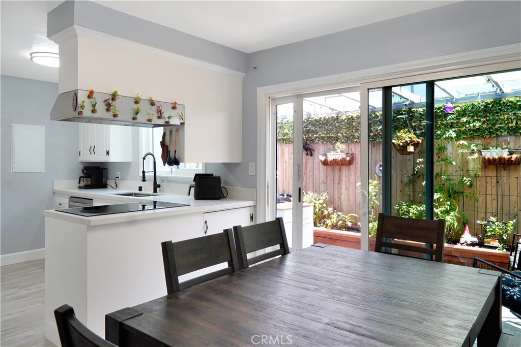 Located within the highly sought-after Troy High School boundaries, this beautifully renovated, gated home offers a true tropical retreat, surrounded by lush, mature landscaping that creates a private and peaceful setting.
Step inside this fully upgraded two-story unit—attached, with no neighbors above or below—and enjoy high-end finishes throughout, along with a charming urban garden that brings vibrant greenery right to your doorstep. The thoughtfully designed layout features ample storage both inside and in the garage, private laundry, and tasteful modern touches in every room.
The main bathroom feels like a spa escape, featuring a deep soaking tub enclosed in glass, a dual vanity, and stunning designer finishes.
Residents also enjoy resort-style community amenities, including a sparkling pool and a clean, well-maintained clubhouse—ideal for weekend relaxation or entertaining.
Perfectly situated with convenient freeway access, this home is just minutes from award-winning schools, world-class dining, premier shopping, and top-tier entertainment.
313 N. Acacia isn’t just a home—it’s a private oasis in the heart of it all. Come experience the lifestyle for yourself.