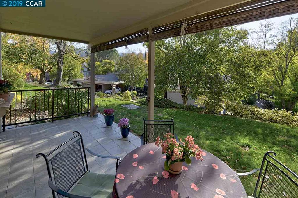 What sets this Sierra model sets this home aside from the rest is the lush landscape and sprawling grass lawn with views of the beautiful hills painted with all the fall colors from rare level-out patio. An abundance of natural light streams freely throughout the home. The unique features this home offers is endless....updated eat-in kitchen, wood burning fireplace, spa inspired bathrooms, master bedroom is spacious with ensuite bathroom offering dual walls of closets, spacious laundry room with storage cabinets, custom windows & coverings .....offering the most wonderful outdoor living space specifically designed to showcase the ultimate California lifestyle seamlessly combining indoor & outdoor living and easy walk to all the wonderful amenities Rossmoor has to offer.