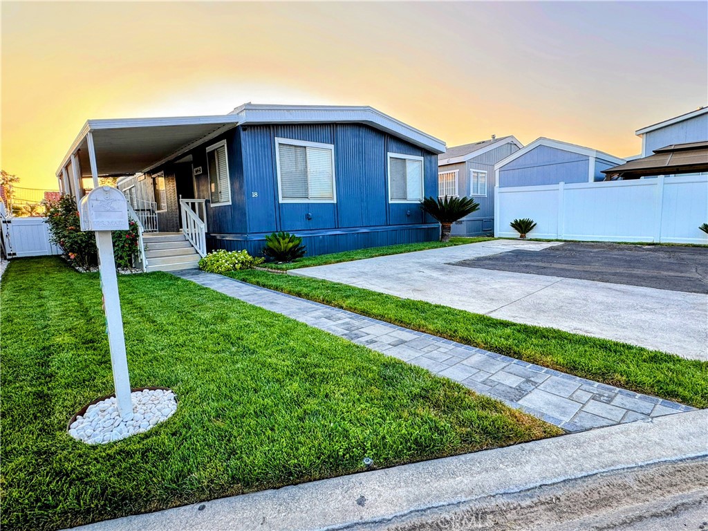 **Charming & Spacious three-Bed, two-Bath Mobile Home in a Gated Community for All ages*
Don’t miss this beautifully maintained mobile home located in a peaceful, family-oriented park. This move-in ready home offers the perfect blend of comfort, style, and functionality.
*Kitchen: The open-concept layout boasts modern finishes, including wood-style flooring, a stylish two-tone kitchen with granite countertops, a large island, and stainless steel appliances. The living and dining areas are filled with natural light, perfect for family gatherings or entertaining guests.
*Functional laundry area with upper cabinets for storage
* Bedrooms: The spacious primary bedroom features elegant furniture and a rich accent wall for a luxurious touch. Two additional bedrooms are thoughtfully designed—with fun and colorful themes.
* Bathrooms: Enjoy two full bathrooms, each tastefully updated with stylish vanities, floral shower curtains, and modern fixtures.
* Laundry Area: Dedicated laundry space with upper cabinets for extra storage and a washer/dryer setup that makes everyday chores a breeze.
*Backyard & Outdoor Living: Step into your private backyard retreat with low-maintenance artificial turf, a paved patio, and a covered porch—perfect for entertaining or relaxing. The large front and side porches offer plenty of space for kids to play or to store toys and scooters.
*Interior Features:
Wood-style flooring throughout
Ceiling fans in bedrooms
Decorative wall colors and accent décor
Ample storage and cabinet space
* Community & Parking:
Located in a well-kept mobile home park
Convenient off-street parking
Close to schools, shopping, and major freeways
*Location: Tucked in a quiet cul-de-sac with beautiful views of surrounding mountains and just minutes from all local amenities.
*Schedule your showing today and make this beautifully cared-for home yours!