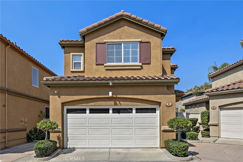Rare DETACHED condo in the coveted Los Abanicos tract in Rancho Santa Margarita! This updated home features an open concept downstairs with living room, dining area, kitchen and a powder room. The upgraded kitchen features designer quartz countertops & subway quartz tile backslash, Shaker custom cabinets, slow close drawers & upgraded hardware. Cooking is a pleasure with the stainless steel 5-burner gas range, microwave/hood, dishwasher & refrigerator. Luxury Pergo laminate plank flooring add to the home's appeal while Plantation shutters are installed throughout the home. All interior doors were replaced by the previous owner w/ modern 6 panel doors. Upstairs, you'll find a spacious primary suite with a customized walk-in closet system with built-in drawers and shelving. The en suite primary bathroom was remodeled a few years ago, with a dual sink vanity & stone shower & glass door. Two additional spacious rooms upstairs with large windows fill the rooms with natural light. The hall bathroom features a newer vanity. Outside you'll love the private wrap-around backyard, perfect for BBQ’s or unwinding after a long day. High efficiency AC & furnace. The attached two-car garage offers storage & laundry area. Los Abanicos community is a Mediterranean inspired neighborhood located minutes from stores, restaurants, and services in the central region of Rancho Santa Margarita. Master Association amenities include swimming pools, the Beach Club, summer concerts, and access to Rancho Santa Margarita Lake. The Los Abanicos association offers a swimming pool, spa, hiking & biking trails, playground, picnic area, clubhouse, sport court, and outdoor bbq area. Conveniently located near shopping, restaurants, and RSM Central Park & Library.