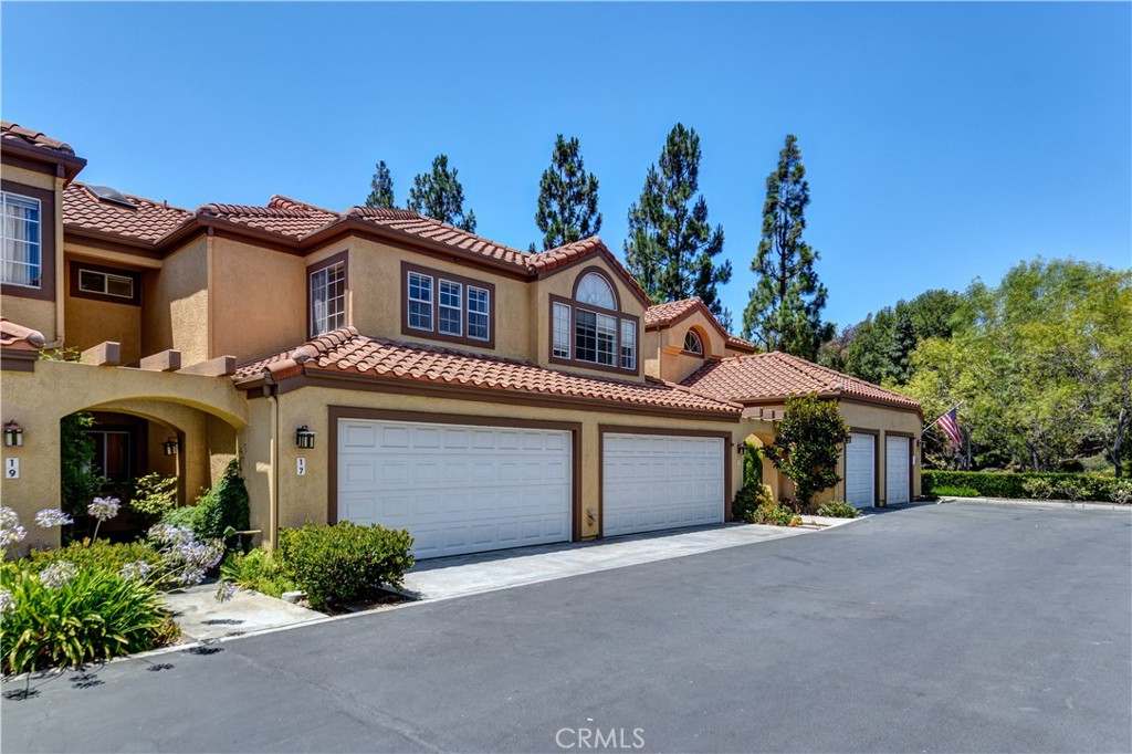 Live the Aliso Viejo Dream at 17 Via Athena: Discover the perfect blend of natural beauty, community charm, and urban convenience. This stunning condo offers not just a home, but a lifestyle in a highly sought after location. Don't miss this opportunity. Step inside this home to find and well designed layout including vaulted ceiling, lots of natural light, a modern fireplace, dining area with access to the large patio to enjoy the gorgeous views while enjoying a BBQ with friends and family. The stunning kitchen is complete with stainless steel appliances, black granite counter tops and upgraded cabinetry and tile flooring. The living room and dining room flooring is a beautiful light wood color laminate. This home is 2 story unit with (2) bedrooms, (2) bathrooms upstairs and a Powder bathroom down stairs. The spacious Primary bedroom in complete with a large ensuite bathroom, high ceilings, natural light & enjoy the views from the balcony. The 2nd bedroom has private access to the the upstairs bathroom giving privacy & convenience. The loft area upstairs has many options to be used as: such as a exercise area, study, play area, office or TV/game area. The attached garage has 2 parking spaces, laundry area, with storage and a new garage door opener that was just installed. This unit has been freshly painted and ready to be lived in and enjoyed! Come take a look and make this house your home.