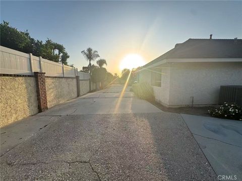 Photo of 3233 E Cameron Avenue, West Covina, CA 91791 (MLS # CV26093659)