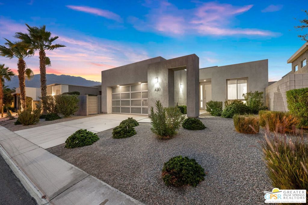 Step inside this turnkey modern retreat located in the heart of Escena Golf Club, one of Palm Springs' most coveted gated communities. With 1,976 square feet of clean lines, natural light, and thoughtful design, this 3-bedroom, 2.5-bath home invites you to settle in without lifting a finger. The open-concept layout flows effortlessly from a sleek chef's kitchen to a bright, airy living space all framed by clerestory windows and oversized sliders that invite the outdoors in. Offered fully furnished, every detail feels intentional, from the designer finishes to the comfortable, modern aesthetic throughout. Step out back to your own private escape: a sparkling pool and spa, surrounded by lush hedges, swaying palms, and dramatic mountain views. Whether you're hosting friends or enjoying a quiet morning, this backyard delivers the tranquility and privacy you've been craving. Two en suite bedrooms offer flexible living options, and the entire home is tucked within a community known for its walkable design, golf course access, and close proximity to downtown Palm Springs.