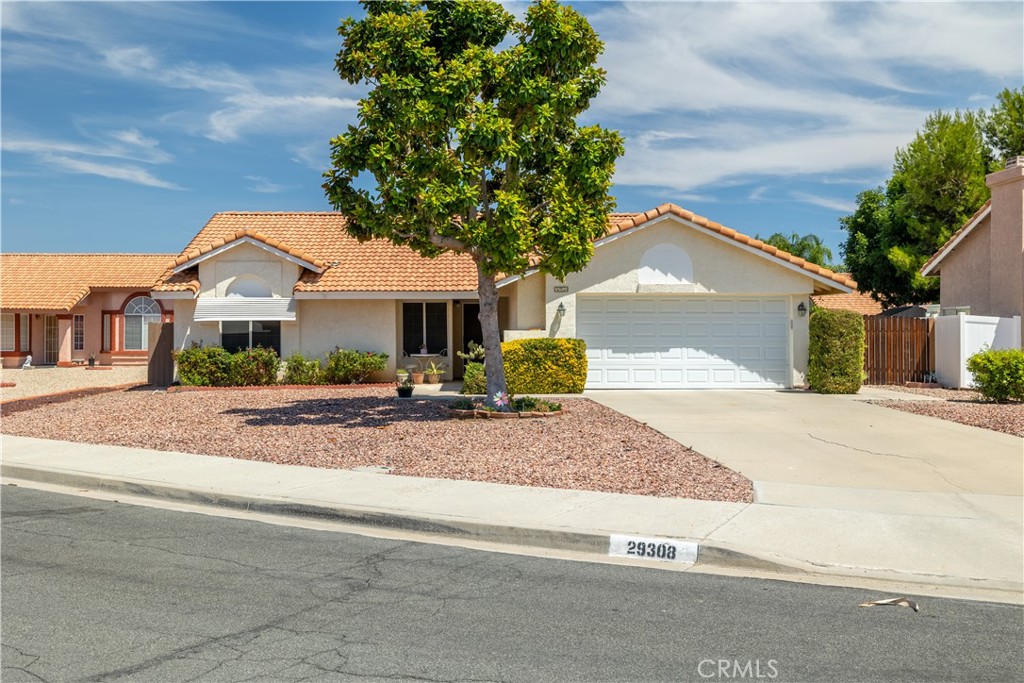 Welcome to this 55+ single-story home tucked away on a quiet cul-de-sac. Best part NO HOA and LOW TAES This home has an open floor plan with tile floors and wood laminate in all three bedrooms and the living area. The living room feels cozy with its stone fireplace and ceiling fan, and it flows right into the dining area. The kitchen features granite counters, nice cabinetry, and stainless-steel appliances. There are two dining areas that connect smoothly, making it great for meals or gatherings. The laundry room is right next to the kitchen for convenience. From the dining area, a sliding door opens to a peaceful backyard with a wood-covered patio, plenty of hardscaping, grass, and mature landscaping. All three bedrooms are roomy. The primary bedroom has its own slider to the backyard, a walk-in closet, and an ensuite bathroom.
*** Professional photos will be available by Friday ***