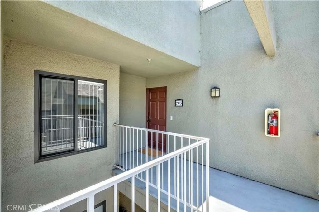 Photo of 17722 Sergio Cir Cir #203, Huntington Beach, CA 92647 (MLS # OC25272166)