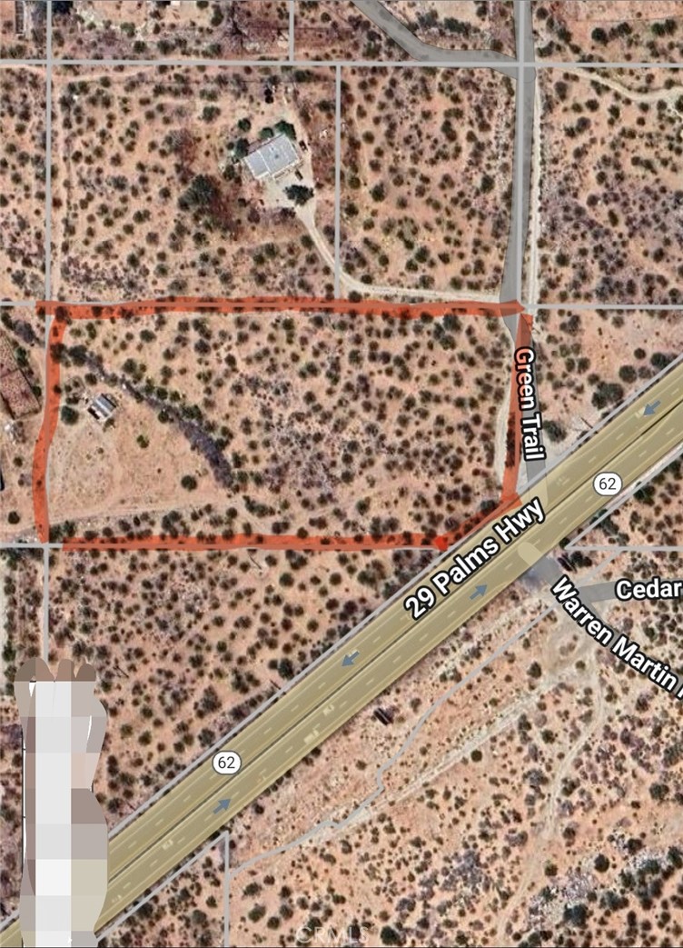 4.825 acres to start your future project. Parcel right off 29 Palms Hwy. Rural/ Residential. The lot has a small structure (cabin) with no services.