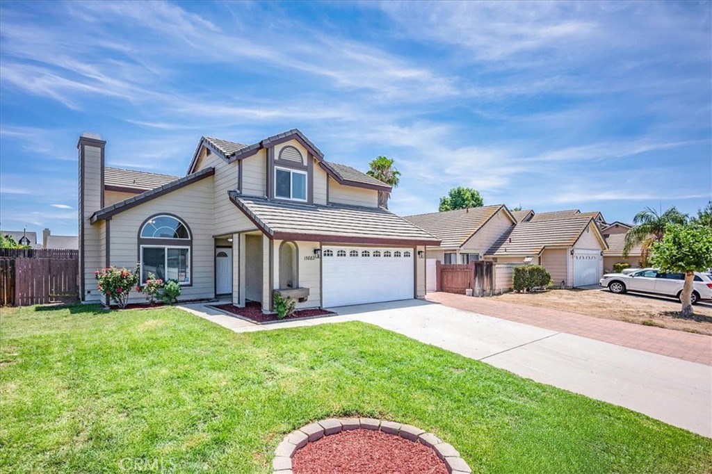 This beautifully renovated two-story Moreno Valley home is move-in ready and offers great curb appeal on a spacious lot with RV parking. Inside, you'll find a bright and airy layout featuring vaulted ceilings and a cozy fireplace in the living room, creating a warm and inviting space filled with natural light. All three bedrooms are located upstairs, providing privacy and comfort. Whether you're entertaining or just enjoying a quiet evening at home, this property has everything you need—style, space, and functionality.