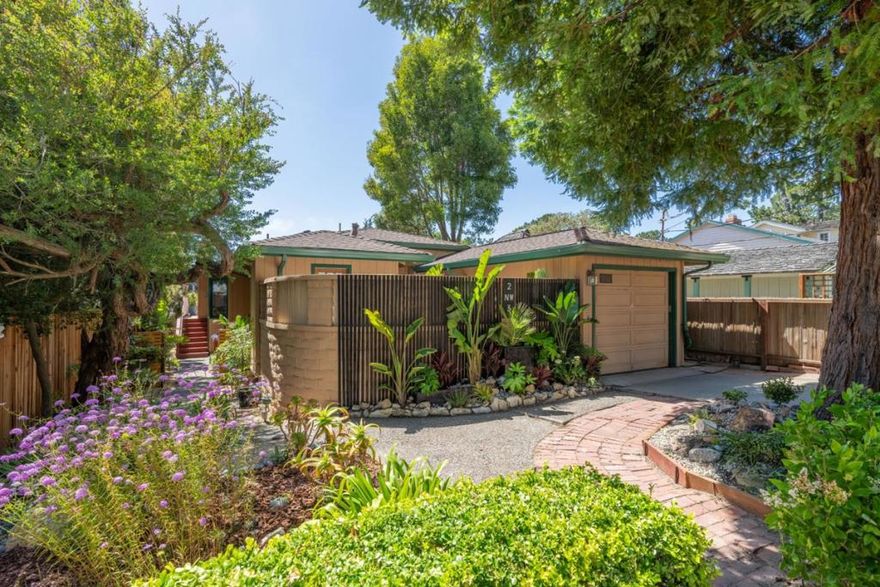 Immaculate Carmel Cottage This beautifully refreshed Carmel-by-the-Sea cottage offers 2 bedrooms, 2 bathrooms, plus a versatile bonus room ideal for a home office, yoga space, or guest overflow. Conveniently located just a short stroll to downtown and the beach, the single-level floor plan features gleaming hardwood floors, an open-concept living area, and a bright, airy feel throughout. The living room opens directly to a private back deck perfect for relaxing or entertaining while the front features a walled patio and a one-car garage. Enjoy a small filtered peek of the ocean from the living room and thoughtful touches like ample closet space and a spacious primary bath with dual sinks, a comfortable relaxing tub, and a separate shower. This is a true opportunity in an exceptional Carmel-by-the-Sea location.