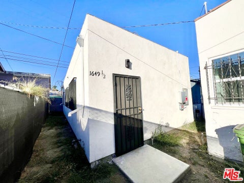 Photo of 1649 W Florence Avenue #1/2, Los Angeles, CA 90047 (MLS # 26103818)