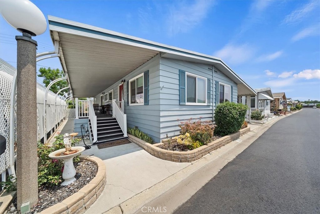 Newly renovated, Two suite unit. Close to the entry of the park with no neighbor behind. Allowing a private and larger than average side and backyard. Inside you will find an Open concept kitchen with gorgeous, custom built cabinets and quartz counter tops. Bathrooms have also been renovated with custom cabinets and the same gorgeous quartz countertops. Newer paint through-out with Wood-like flooring. Plenty of pantry space with an in unit laundry area. Must see to appreciate. Outside you will find a covered patio and a producing garden with herbs, fruit and veggies. This community is well cared for and has one of the lower space rents in the area. Close to hiking trails, freeway access, dining and shopping.