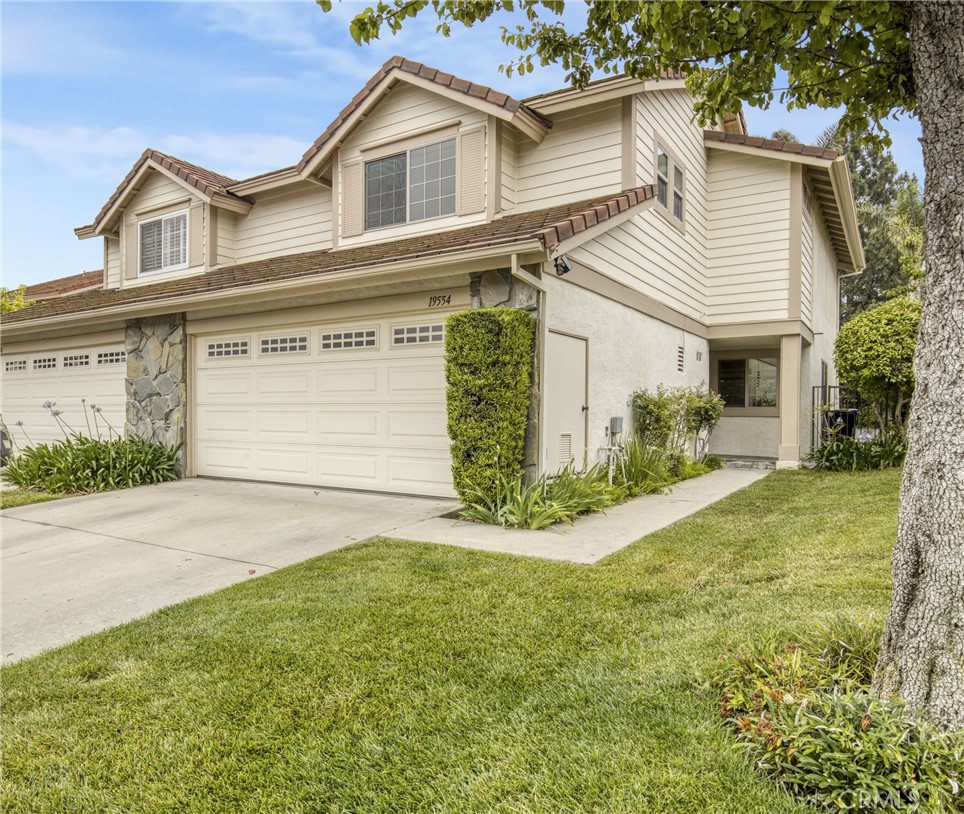 Bright & Spacious Townhouse in Prestigious Gated Porter Ranch Community Welcome to this beautifully maintained 2-bedroom, 2.5-bath townhouse offering 1,767 sq. ft. of elegant living space in the highly sought-after gated community of Porter Ranch. Ideally located on a quiet cul-de-sac, this home is perfect for families, offering a child-friendly environment with minimal through traffic. Step inside to find a bright and open floorplan filled with natural light and laminate flooring throughout. The inviting living room features soaring vaulted ceilings, recessed lighting, smooth ceilings, and a cozy fireplace, creating a warm and airy ambiance. The open dining area flows seamlessly into the kitchen, which includes granite countertops, stainless steel appliances, and a breakfast nook. Upstairs, you’ll find two spacious primary suites, each with large walk-in closets and full en-suite bathrooms. Both bathrooms are appointed with granite vanities and plenty of storage. Enjoy resort-style living with exceptional HOA amenities including multiple pools and spas, tennis and basketball courts, picnic areas, and 24-hour guarded gate security. Outdoor enthusiasts will love the proximity to scenic hiking trails, and the home’s location offers convenient access to top-rated schools, shopping, dining, and major freeways. Don’t miss the opportunity to own a bright, turnkey home in one of Porter Ranch’s premier gated communities!