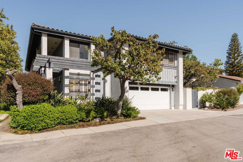 This updated Palisades Highlands home is spacious, bright, and filled with natural light. The entry opens to soaring ceilings above the living and dining rooms - perfect for entertaining or cozy nights by the fireplace. To the left, a large kitchen and adjoining family room seamlessly into a sprawling grassy yard with a spa and multiple lounge areas - perfect for gatherings large or small. Upstairs, the generous primary suite features a spa-like bath and walk-in closet, while three additional bedrooms are thoughtfully positioned at the other end of the hallway. A downstairs bedroom offers an ideal space for guests or a home office as well. Located on a cul-de-sac, this home offers close access to hiking and biking trails, as well as the Highlands Rec Center with two tennis courts, a heated pool, spa, and playground. Enjoy the feeling of being immersed in nature - just minutes from the beach.