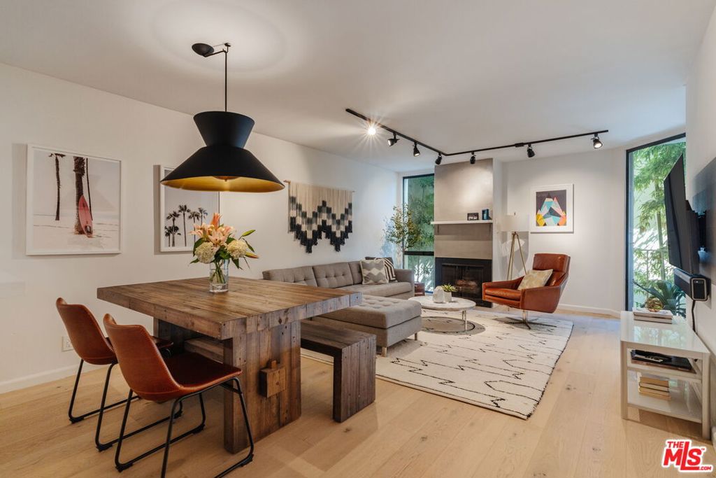 With an ideal West Hollywood location, this private & recently renovated unit makes the perfect retreat. You're greeted with beautiful white oak floors that run throughout the unit. For those who enjoy their time in the kitchen, you'll love the quartz countertops, stainless appliances, and sleek white cabinets with plenty of storage space. The seamless flow from the kitchen to the living room and dining room is perfect for entertaining. A spacious main room affords a generous area for dining while still leaving plenty of room for seating in the living room around the cozy fireplace. The bedroom creates the perfect sanctuary, boasting a large walk-in closet and access to the balcony. The sizable bathroom has also been renovated, boasting ample storage in the linen closet or additional hall closet. Once you're ready to venture out onto the town, you'll find you have easy access to all that West Hollywood has to offer with numerous restaurants, theaters, night-life, and shopping nearby. Building amenities include a pool, BBQ/lounge area, exercise room, secure parking, and a beautiful outdoor courtyard experience. Laundry rooms are conveniently located on each floor for easy access.