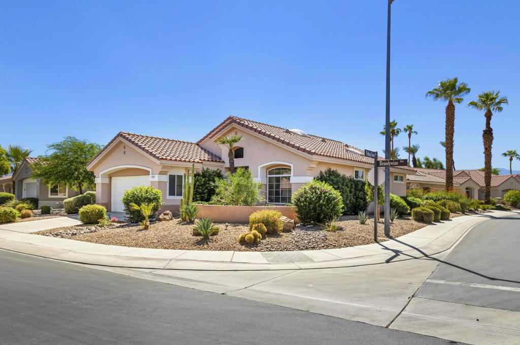Absolutely fabulous -A rarely available TOWLE model Newly painted and move in ready ... Very welcoming front entry hall with a large storage closet. The great room is a very bright and open space with lots of windows looking out onto the yard... Two bedrooms...one being a primary suite with updated shower and walk in closet The guest bedroom is at the opposite end of the house and has an adjacent bath. The laundry has been moved to the garage and the utility room is now a very convenient office Two car attached garage with built in storage. A nice secluded patio area for outdoor entertaining. All this plus you get to live in one of the best 55+ communities with so much to offer...24 hour guard gated security, outdoor pools, indoor pool, 2 fitness centers, tennis, pickleball, and an abundance of clubs and activities to keep you busy. Its a win-win ...