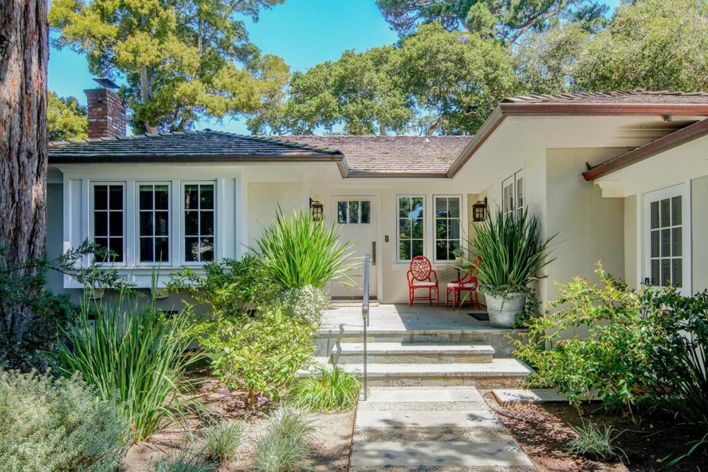 An exquisite single-level home nestled on a quiet street in Carmels coveted Golden Rectangle, this beautifully updated residence blends timeless Carmel charm with modern comforts. The spacious living room features a cozy fireplace, vaulted ceilings, and hardwood floors, flowing seamlessly into the dining area and large kitchen with elegant stone countertops. With three impeccably renovated bedrooms and two stylish baths, the home offers both comfort and sophistication. A convenient laundry room includes a sink and cabinets. Set back from the street, the property enjoys a generous front yard with a welcoming fire pitperfect for gathering and enjoying the charm of the neighborhood. All that, and 5 blocks to the beautiful Carmel Beach and close to downtown with all its amenities and fabulous restaurants.