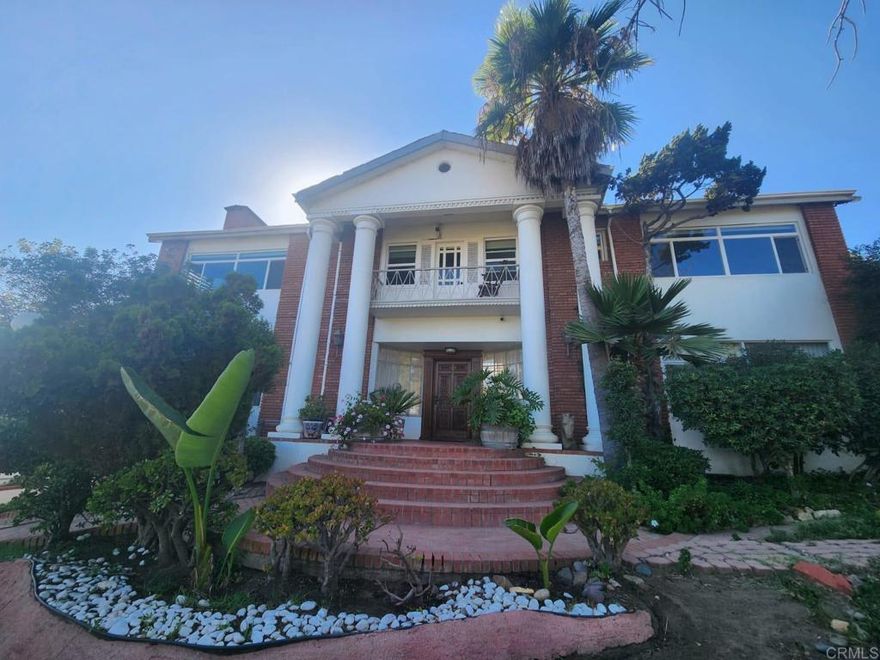 PRICE REDUCTION! Discover a unique opportunity to acquire this architectural jewel in the exclusive Fraccionamiento Chapultepec. With its imposing facade and elegant columns, this iconic residence has always been a source of admiration. This property not only offers breathtaking views of the city and the sea, but also a large and versatile space to be enjoyed by family and friends.  Imagine enjoying al fresco breakfasts in the front dining room, with the scenery as a backdrop. The extensive exterior, surrounded by gardens, features a pergola, barbecue and a charming tree house, perfect for unforgettable celebrations and gatherings. With 1,424 m² of land, the space is as big as your dreams. As you enter through the front door, a formal foyer welcomes you.  On the second floor, an elegant living room, a spacious dining room ideal for formal gatherings, all with panoramic views, awaits you. There is a fully equipped kitchen with breakfast area. In addition, a wood-paneled office offers a warm and sophisticated atmosphere for working from home. It could not miss a large game room with living room, bar and bathroom, which connects directly to the indoor pool with its own bathroom. Additionally, it has a maid’s room and laundry room.  On the second level, you will find four bedrooms, three of them with spectacular views and one with a balcony facing the front of the house. The master bedroom is a true sanctuary, with an elegant bathroom and a large closet. The original hardwood floors not only add a touch of opulence, but also warmth, making even the largest spaces feel cozy.  The property is close to restaurants, gas stations, hospitals, shopping centers and various businesses. Just 3 minutes from downtown Ensenada, 25 minutes from Valle De Guadalupe, 1 hour from Tijuana, 1 hour 15 minutes from the U.S. border.