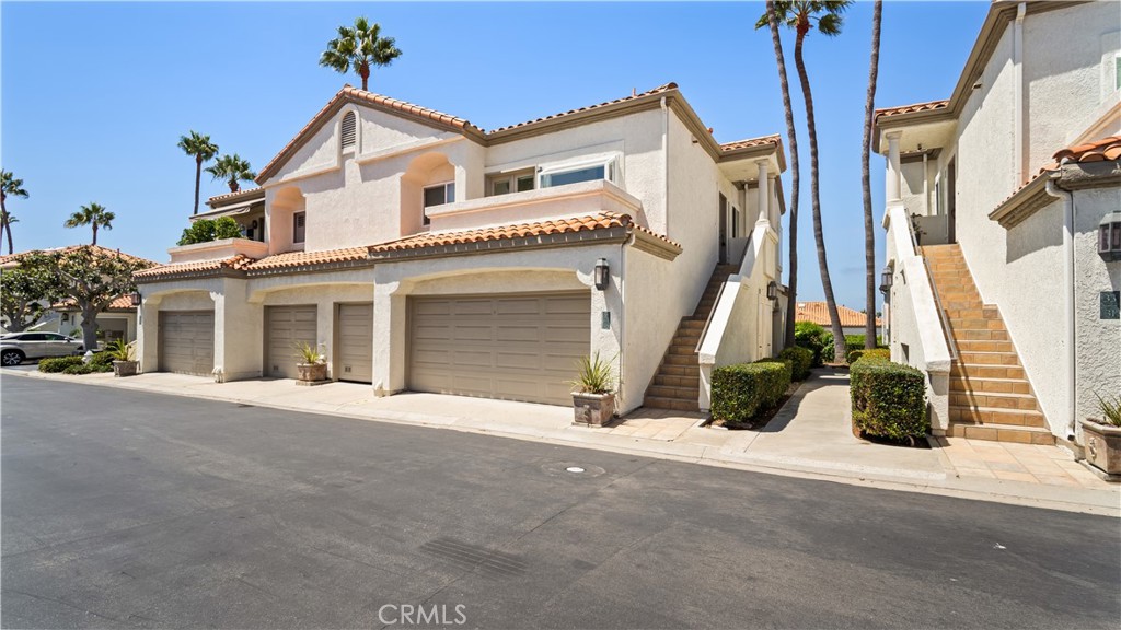Welcome to your dream coastal retreat in the exclusive gated Tennis Villas community, perfectly perched above the stunning Monarch Beach Resort and Golf Links. This beautifully maintained villa offers 2 spacious bedrooms, 2 full bathrooms, and an open-concept living area filled with natural light and ocean breezes.
Step inside to find high ceilings, a cozy fireplace, and sliding doors that open to a private patio — ideal for relaxing or entertaining with peek-a-boo ocean views. The upgraded kitchen features modern appliances and plenty of storage, while the primary suite boasts a walk-in closet and an ensuite bath with dual sinks and a soaking tub.
Residents enjoy resort-style amenities including a sparkling pool and spa, and you’re just minutes from Salt Creek Beach, world-class golf, the Ritz-Carlton, and Dana Point Harbor.
Live the coastal lifestyle you deserve — come see why this home is the perfect blend of luxury, comfort, and convenience!