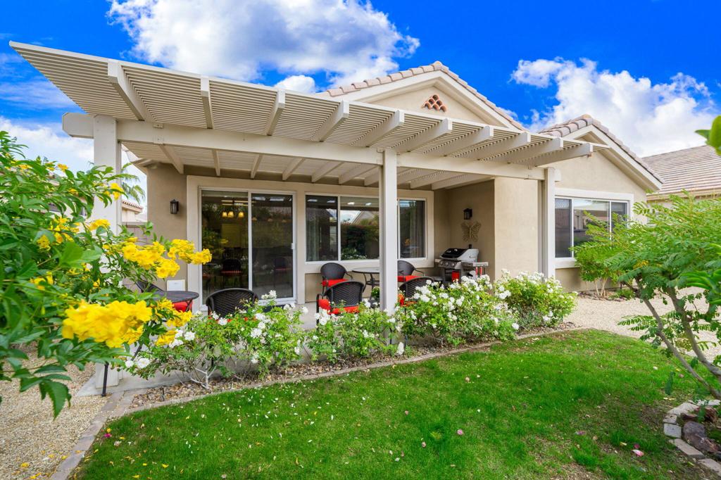 This PRISTINE St. Maarten model gives you two bedrooms PLUS a den! Easy to have friends & family come stay with easy access to the second bathroom. The south facing yard is entertainment ready with lush landscaping and an overhang. The kitchen has been beautifully updated. The bedrooms have lots of closet space! All the beautiful furniture and furnishings are available outside of escrow. Senior Community. HOA fees are paid quarterly. This is an opportunity you do not want to miss!!