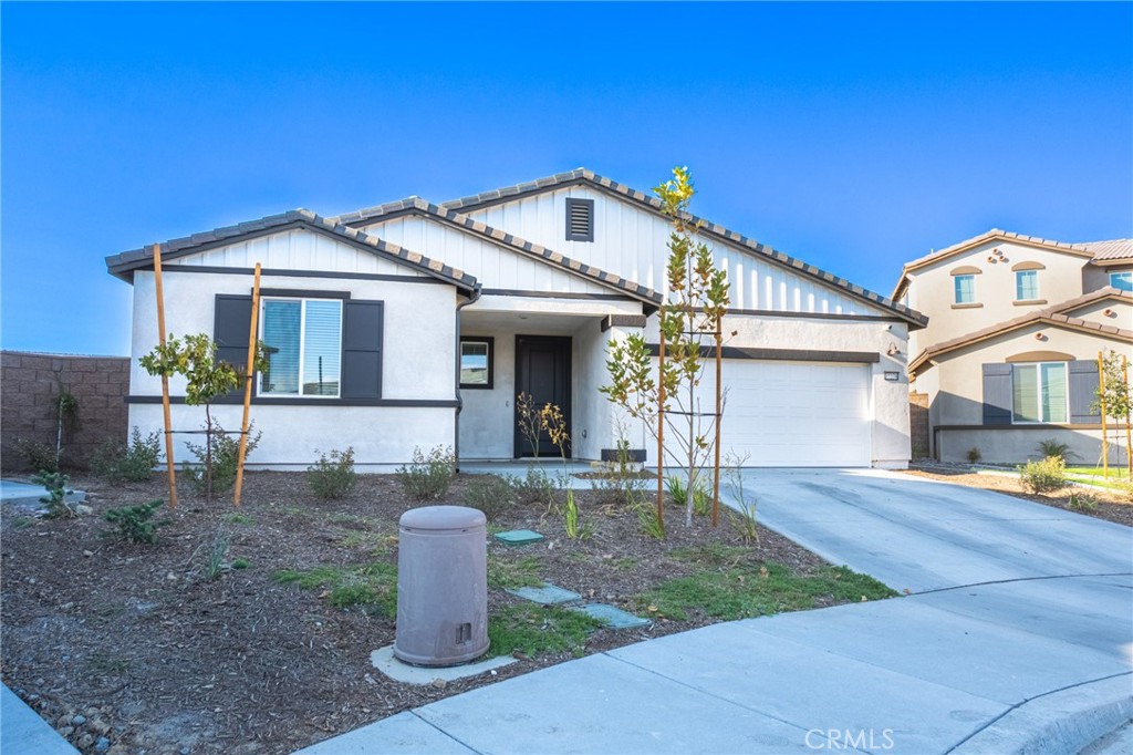 Welcome to 35278 Guldahl Court, a brand-new single-story home tucked at the end of a quiet cul-de-sac in the Magnolia neighborhood at The Fairways. Set on an oversized 8,700+ sq. ft. lot, this 4-bedroom, 2.5-bath residence offers 2,172 sq. ft. of thoughtfully designed living space with the added benefit of fully paid solar for energy efficiency and low utility costs.
The open-concept floor plan features a spacious great room, dining area, and a modern kitchen with quartz counters, a large island, and stainless appliances. The private primary suite includes a walk-in closet and dual vanity, while three secondary bedrooms provide room for family or guests.
The backyard is extra wide and a true blank canvas—ready for a pool, outdoor kitchen, or garden. Its scale and layout invite you to imagine gatherings, relaxation, and the ability to create your own private retreat.
Located within The Fairways, a master-planned community surrounding the championship Morongo Golf Club, residents enjoy manicured grounds, resort-style amenities, a clubhouse, pools, spa, fitness center, and miles of walking trails. This home combines modern comfort with the beauty and lifestyle of one of Beaumont’s most desirable neighborhoods.